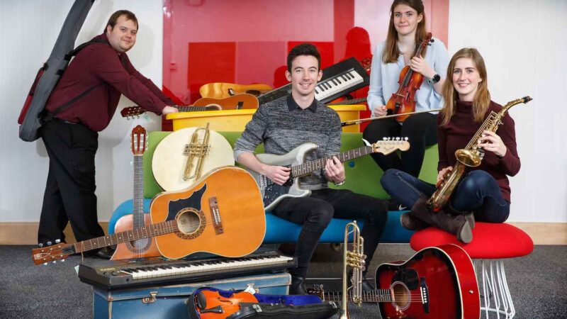 Students-from-the-Royal-Welsh-College-of-Music-and-Drama-inspect-previously-donated-instruments[8]
