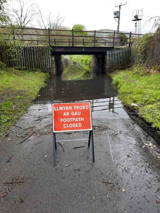 The issue of Flooding again and Rhondda Cynon Taf Council unenthusiastic approach to reopen the Robertstown  Bridge