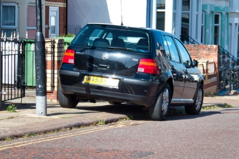 A charity for the visually impaired has urged the Government to do more to crack down on pavement parking.