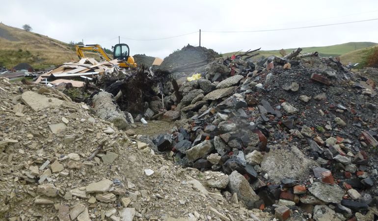 Man prosecuted after over 3,000 tonnes of waste illegally dumped on his land